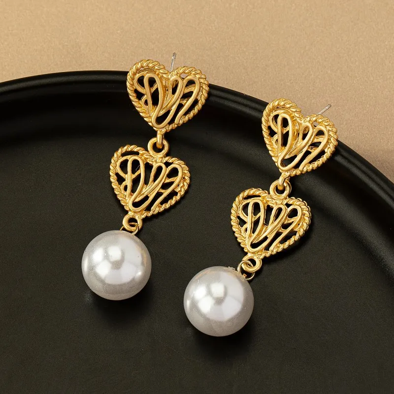 Trade assurance suppliers gold plated pearl drop earrings jewelry fashion hollow heart shape earrings for women