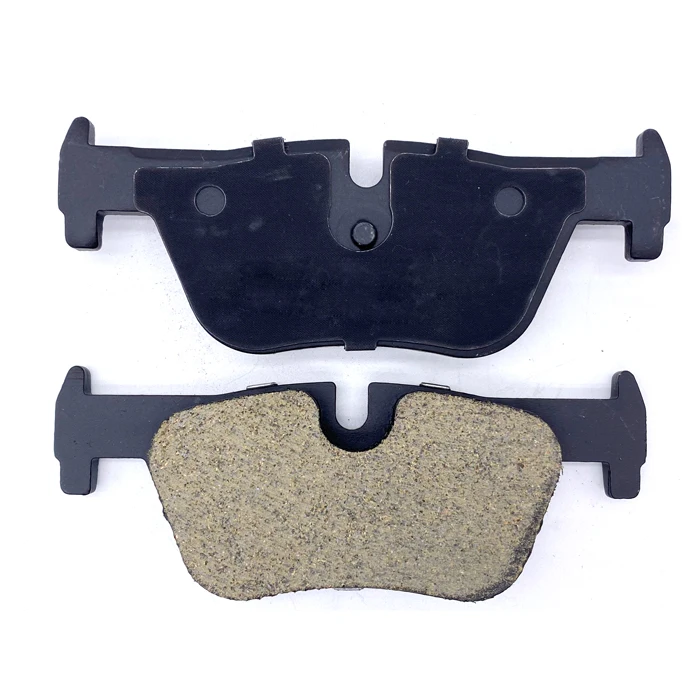 Carbon fiber brake disc pad with shims
