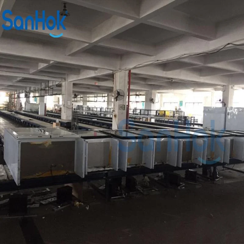 Roller Conveyor And Slat Chain Conveyor Chest Freezer Assembly Line With Cooling And Vacuum Testing Line