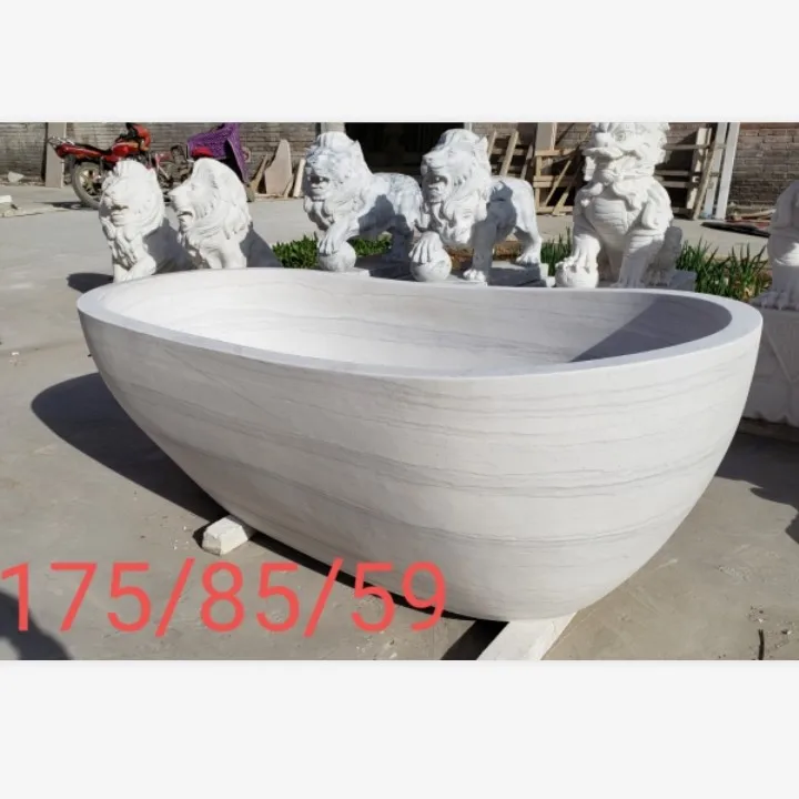 freestanding honed Nero Margiua oval marble stone bathtub