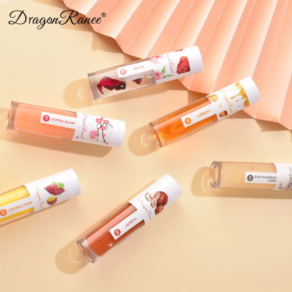 Wholesale Lip Oil Vegan Flavouring Honey Lip Tint Scent Color Changing Tinted Plumping Hydrating Lip Gloss Oil