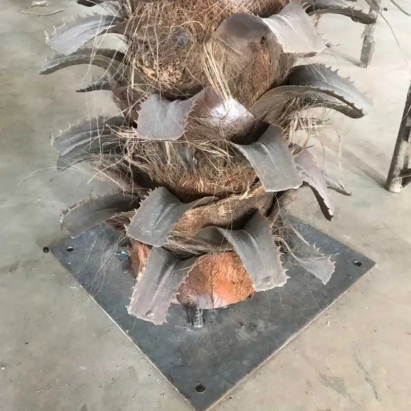 Artificial washingtonia palm tree with real bark and fake leaves