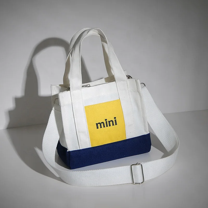 hot sale small natural soft cotton fabric black school bag supplier as graduation gift