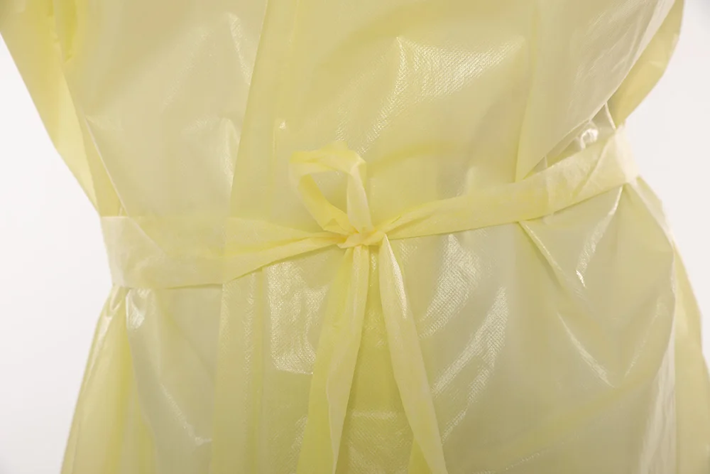 Wholesale ASTM Level 4 PP PE Coated Fully Taped Waterproof  Yellow Disposable Medical Surgical isolation Gown