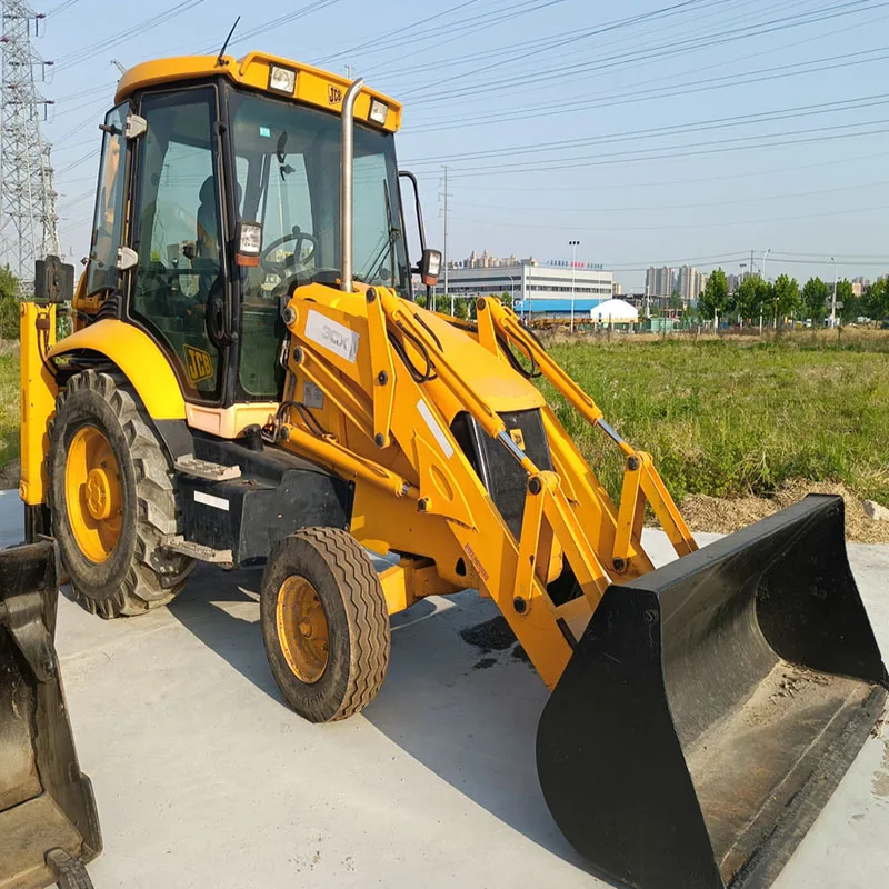 Экскаватор-погрузчик JCB3CX 4 колесные приводные тракторы jcb3cx экскаватор-экскаватор 7 тонн номинальная нагрузка 63 кВт погрузочный экскаватор