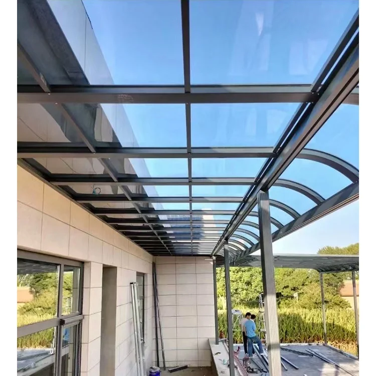Unbreakable aluminum frame awning window with a fixed clear glass canopy over the entrance door