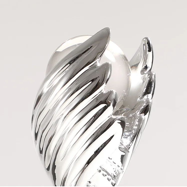 Gold, silver and copper resin trophy customized football and basketball competition group award making flying wings games