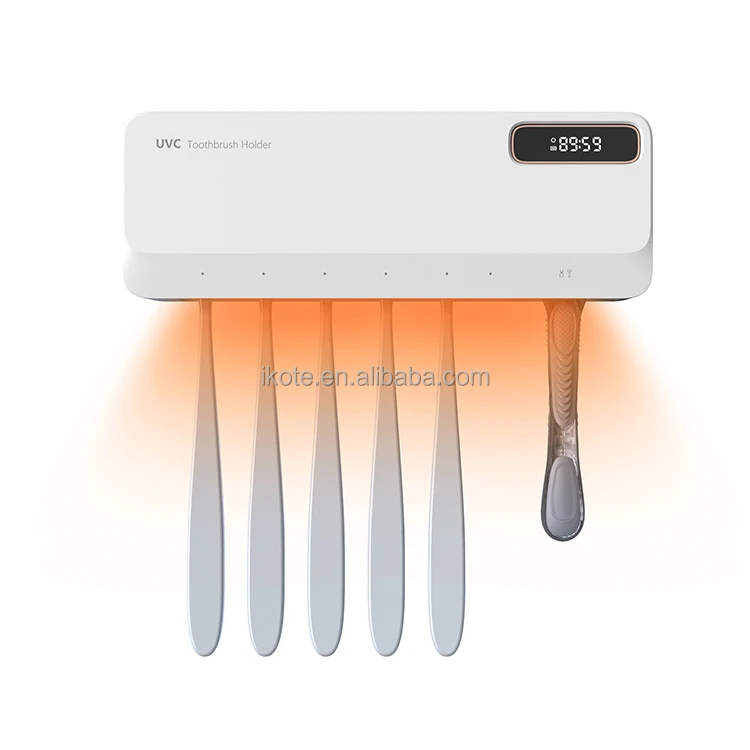 Electric UV Light Oral Care Toothbrush Holder Sanitizer with Kills 99.9% Bacteria Toothpaste Dispenser For Home Use