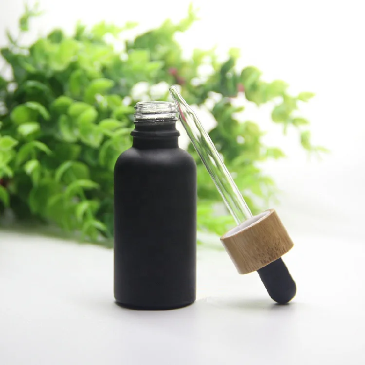 Hot 5ml 10ml 15ml 20ml 30ml 50ml 60ml 100ml essential oil bottle matte black frosted glass bamboo dropper bottle with bamboo cap