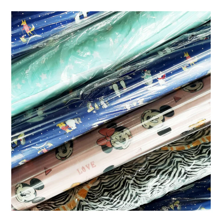 China 140-180 Polyester DTY Brushed Four Way Stretch Knit Printed Stock Fabric For Garment