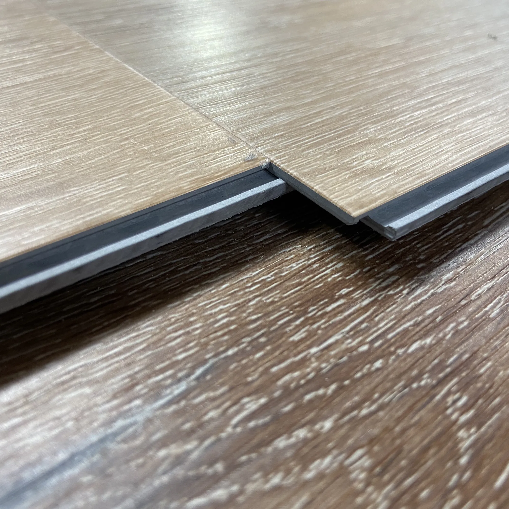 Custom Fireproof Scratch-resistant UV Coated Stone Plastic Composite Plank Realistic Wood Embossed Texture SPC Flooring