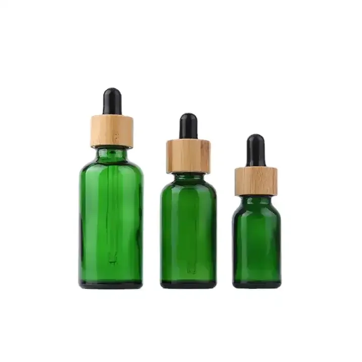 Customized Reusable 10ml 50ml 100ml Empty Green Sunproof Bamboo Glass Dropper Bottle For Essential Oil Hair Oil