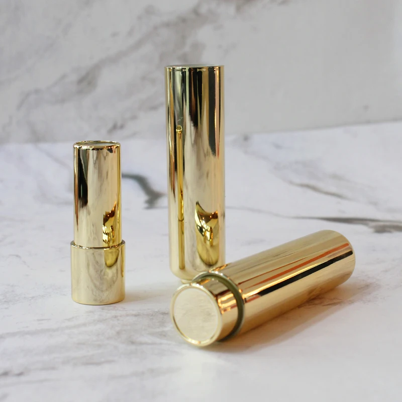 Wholesale luxury lipstick tube gold round shape lipstick container plastic lipstick packaging with customized logo