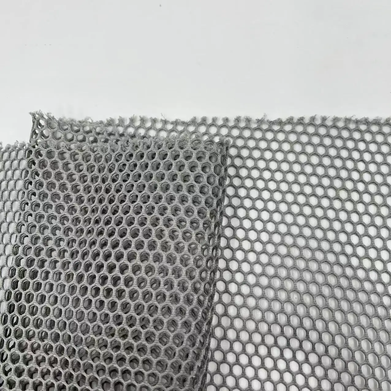 Custom honeycomb 100% polyester hexagon diamond hollow out mesh fabric 3d air mesh fabric spacer sandwich cloth