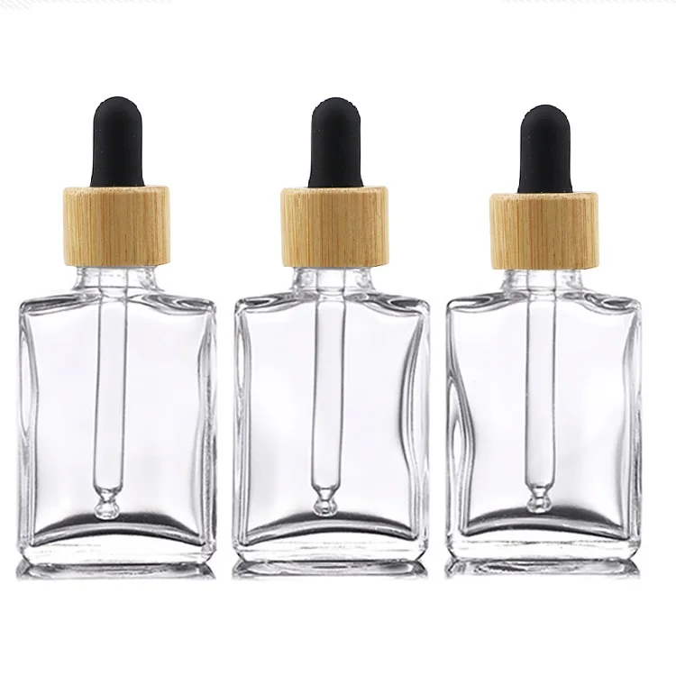 Popular empty clear flat square rectangle 1oz 30 ml Cosmetic  Glass Dropper oil Serum Bottle 30ml with Bamboo Cap