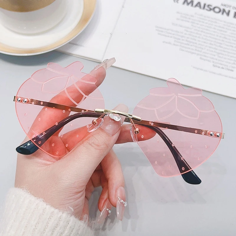 Trendy Unisex Gold Rimless Sunglasses with UV400 Red Lenses Strawberry Style Fashionable Eyewear for Parties