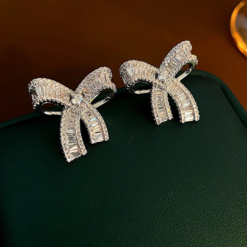 Fashion silver bow knot shining zircon stud earrings