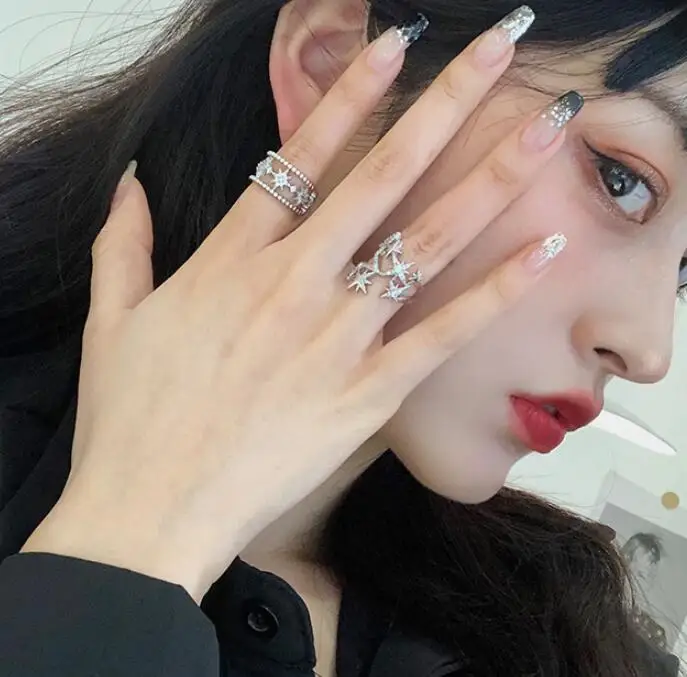 
Korean new design fashion jewelry copper inlaid zircon light luxury opening hollow five-pointed star female party star prom ring 