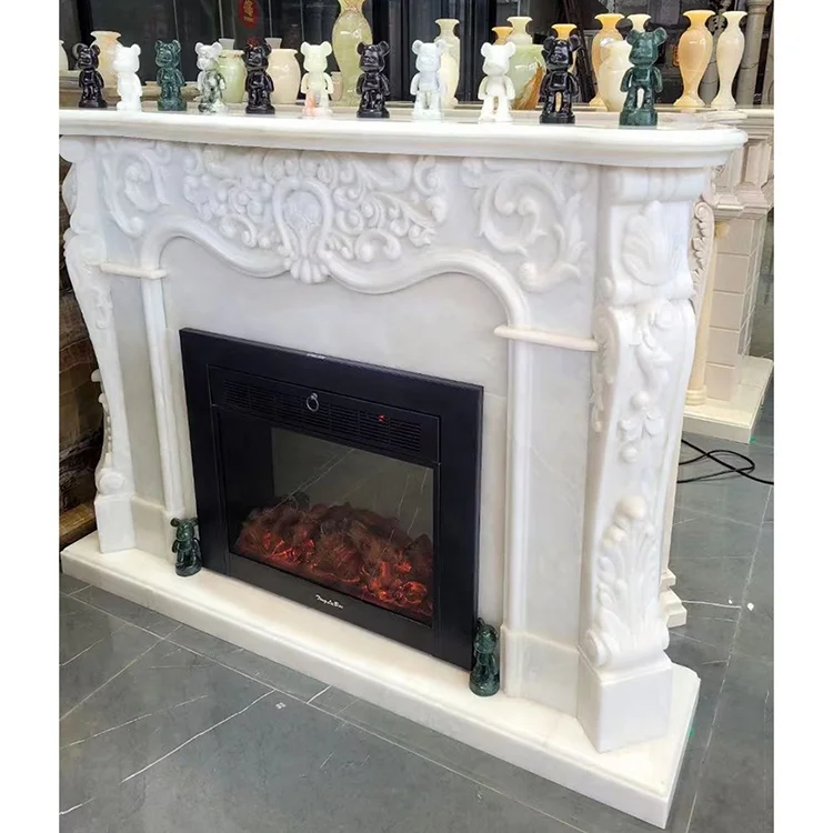Carved white onyx marble stone fireplace mantle surround with electric fireplace