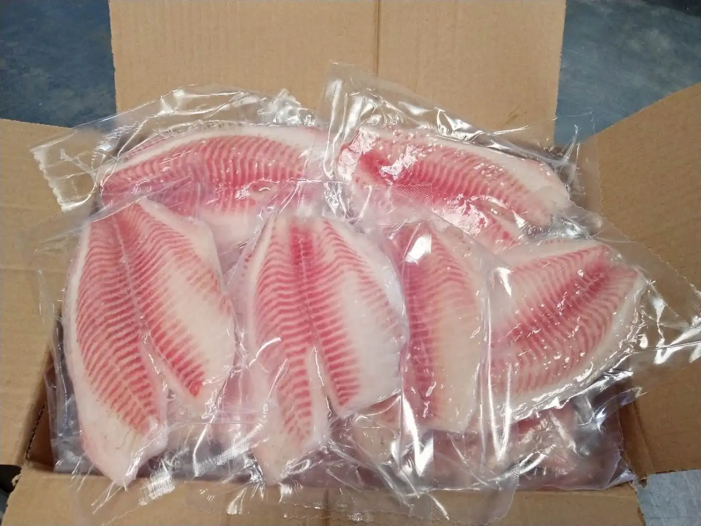2023 hot-sale China tilapia fillet wholesale price frozen fish frozen seafood Fillet  de tilapia fish ,wholesale tilapia