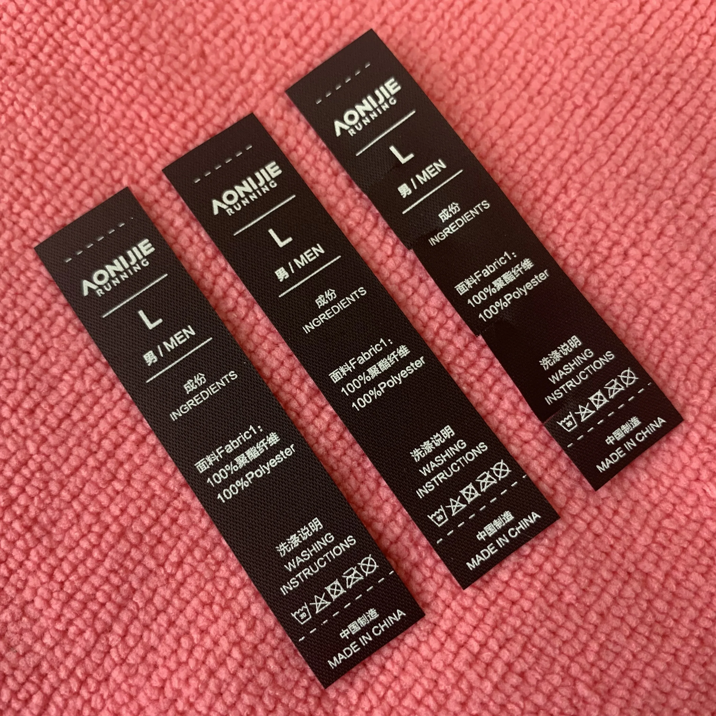 peel off washing instruction black tearaway fabric label,free sample tear away washing tags