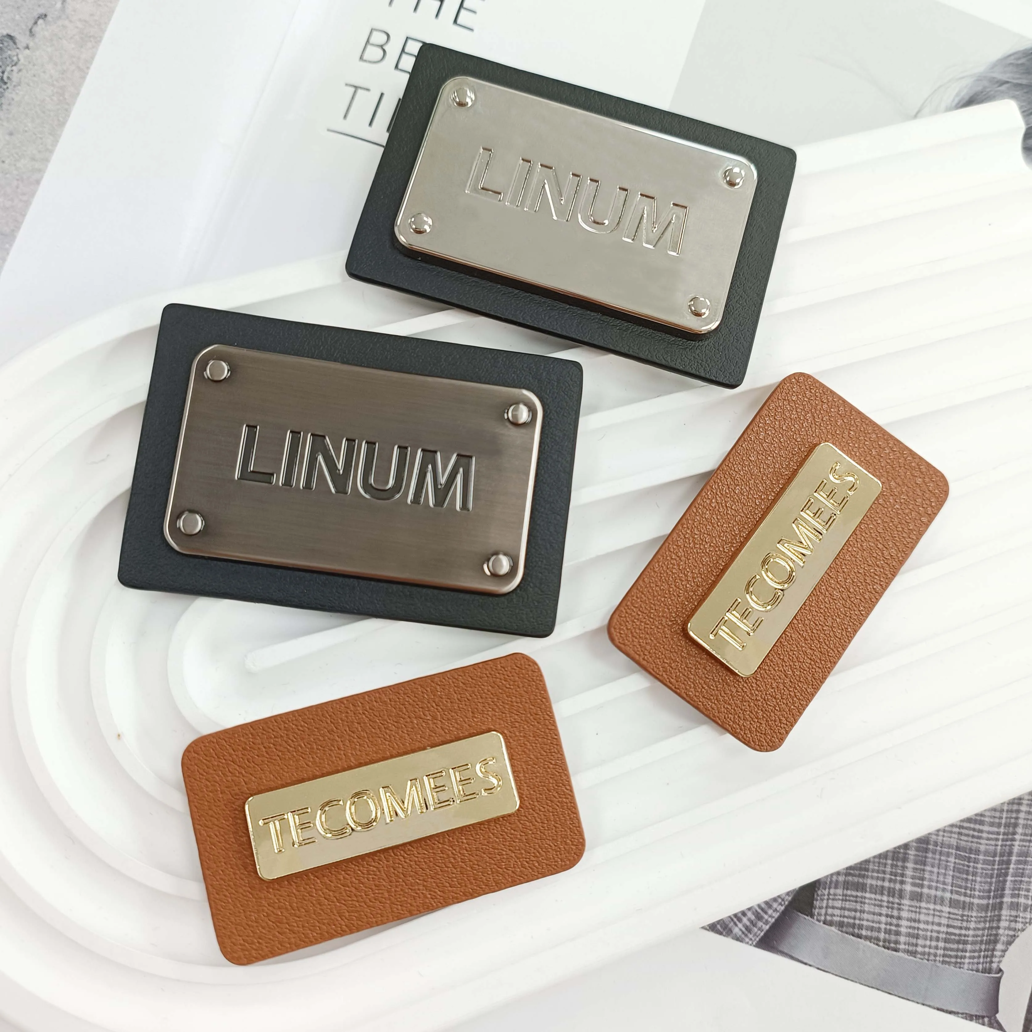 High quality label manufacturer customizes metal logo on leather patch of jeans