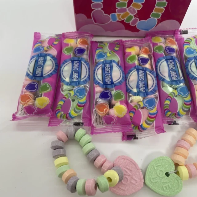 OEM wholesale individually wrap assorted 12g*48pcs*12boxes fruit Bracelet candy Necklace Tablet hard candy