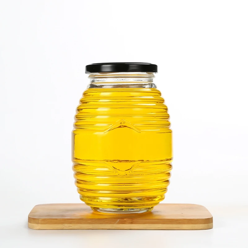 Wholesale Custom Honeycomb Shape Clear Empty 500ml Unique Glass Honey Jars With Lids