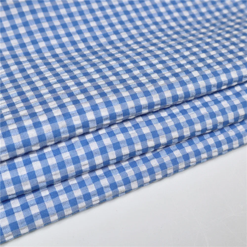 Wholesale check design TC 65/35 seersucker fabric yarn dyed woven polyester cotton fabrics for clothing