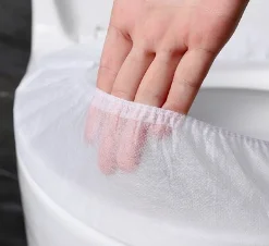 nonwoven disposable toilet seat cover use raw material spun-bonded fabric sustainable PP fabric for hotel use  toilet seat cover