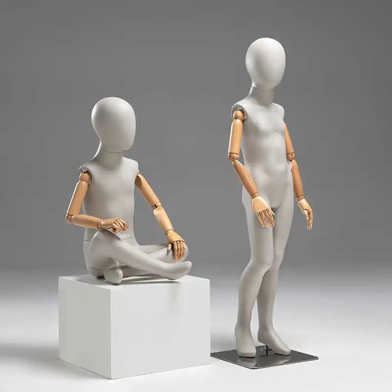 New Fashion Factory Price Grey Fiberglass Kids Mannequin with Wood Flexible Arms Children Clothing Store Window Body Mannequins
