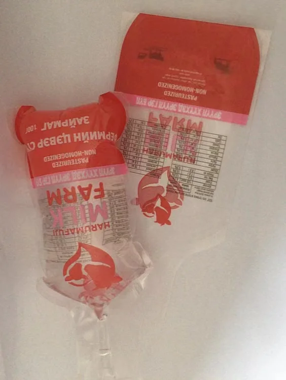 OEM Made Printed Orange Juice ice Lolly Pop Plastic Soft Tube Bag Shape Sealed Injected Laminated Plastic Drink Beverage Pouch