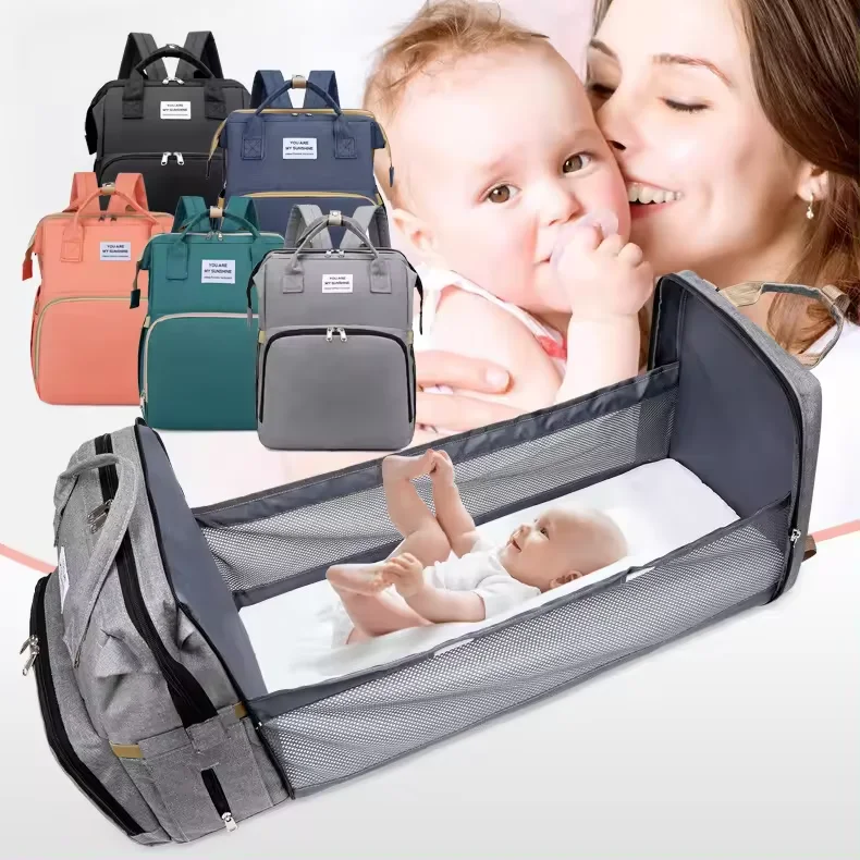 Waterproof Maternity custom  OEM large multi-functional Folding Lightweight Portable baby diaper bag backpack with changing bed