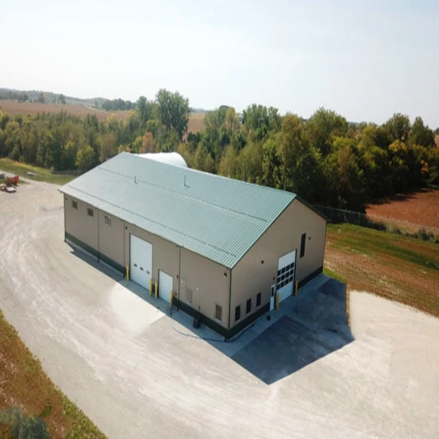 Steel warehouse for a construction site with parapet wall cladding