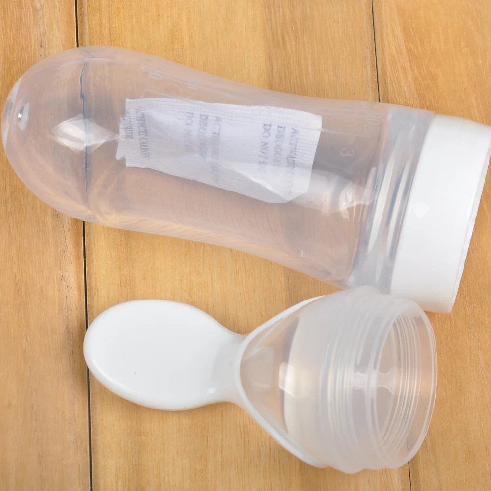Top Selling Baby Feeding Nursing Bottle Milk Juice Squeeze Silicone Spoon Baby Feeding Bottle