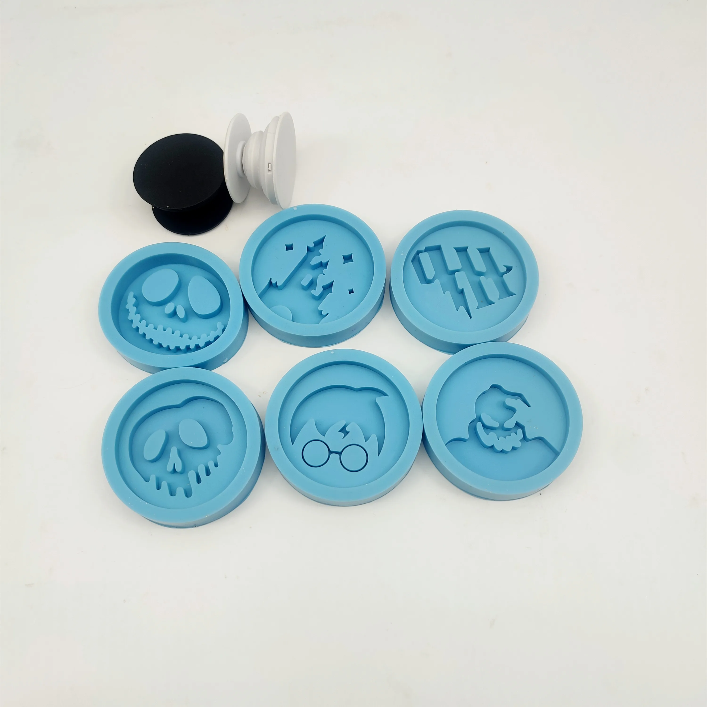 $8 for six cell phone grip molds and six cell phone grip bonus epoxy silicone molds