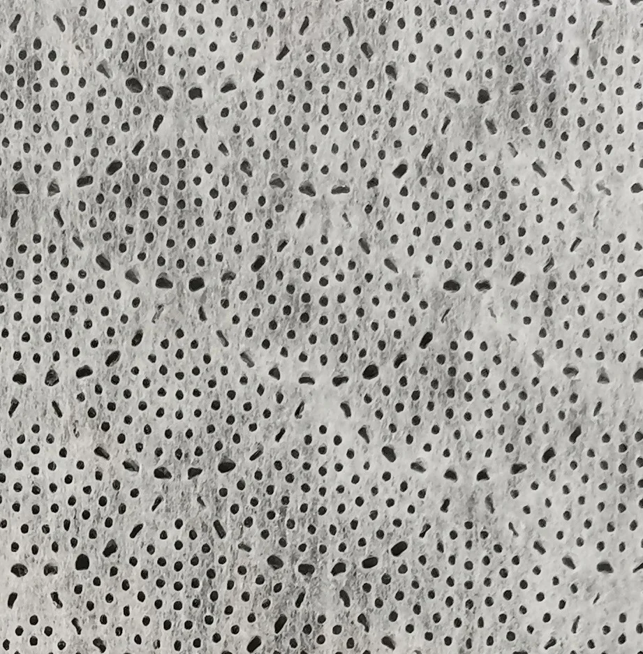 Perforated nonwoven hydrophilic top sheet material for baby diapers/pants