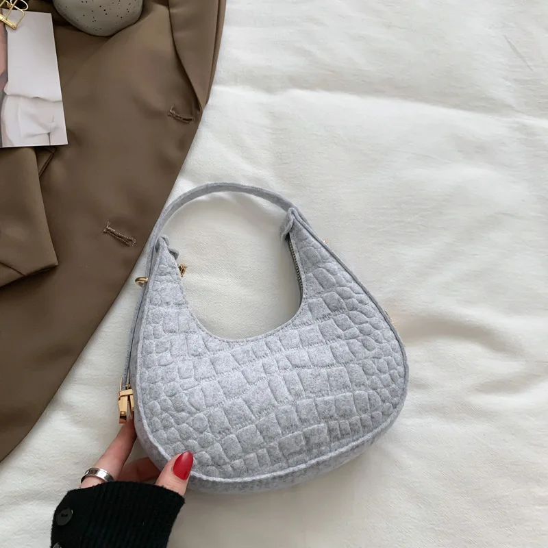 Retro female 2023 new fashion solid color stone pattern shoulder handheld dumpling handbag luxury taobao handbags