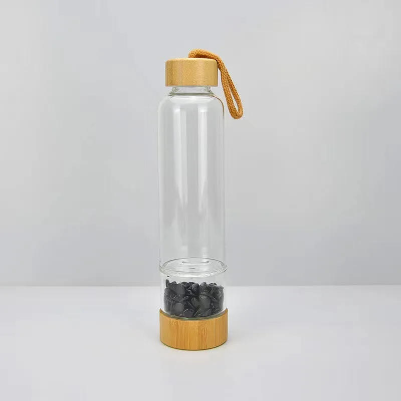High Quality 17OZ Natural Crystal Infused Glass drink Water Bottle Bamboo Lid Gemstone Water Bottle With Crystal Inside