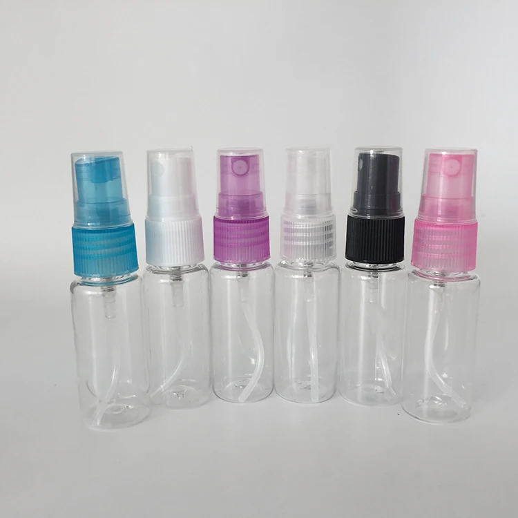 Wholesale 20ml transparent PET spray bottle with fine mist sprayer multi color lid for perfume dispenser, travel, outdoor