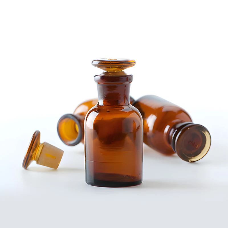 Factory Multiple sizes Amber Apothecary Jars Chemical Laboratory Glassware Glass Reagent Medical Bottles with Lid