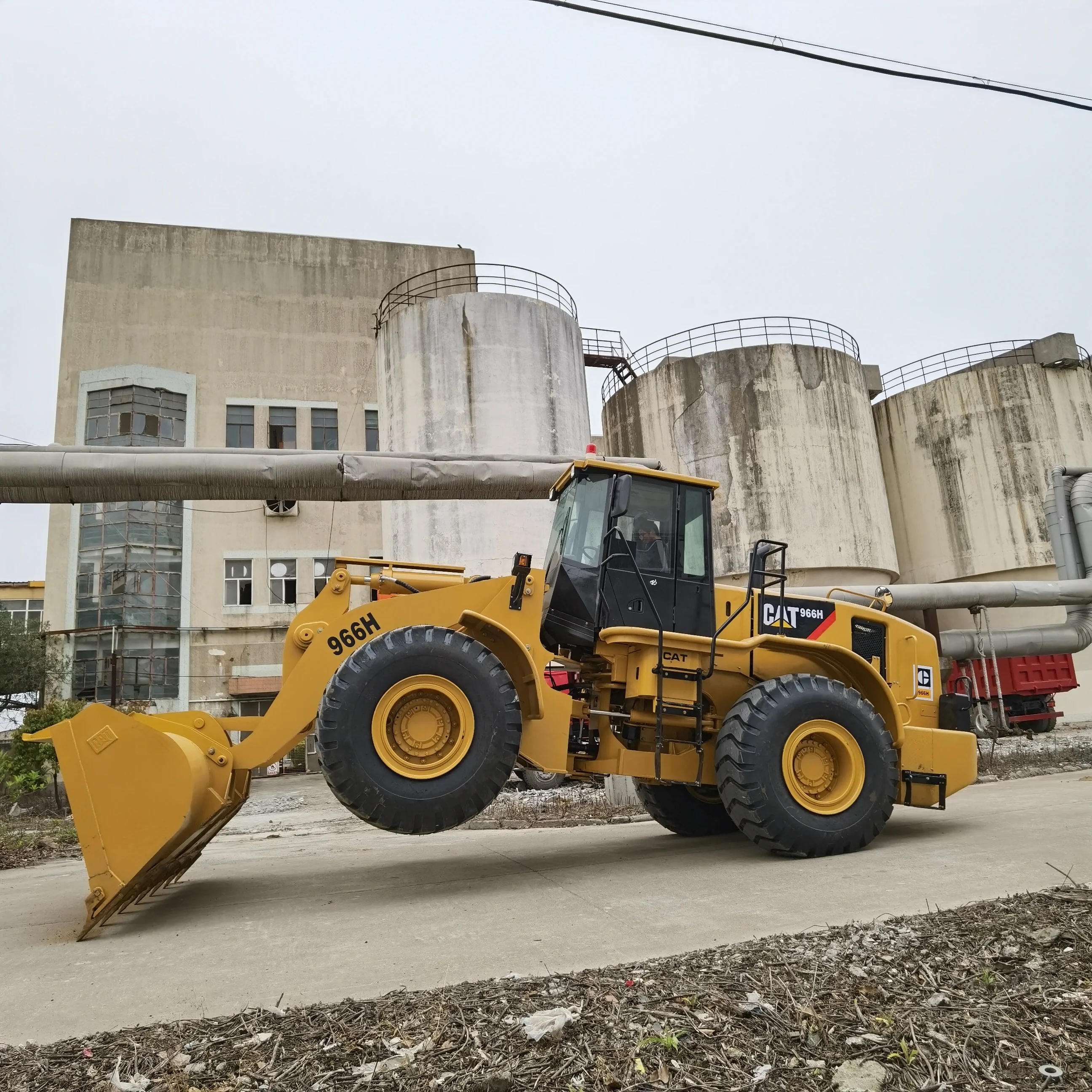 Колесный погрузчик Caterpillar 966H известный всемирно бренд Япония б/у CAT 966K 980G