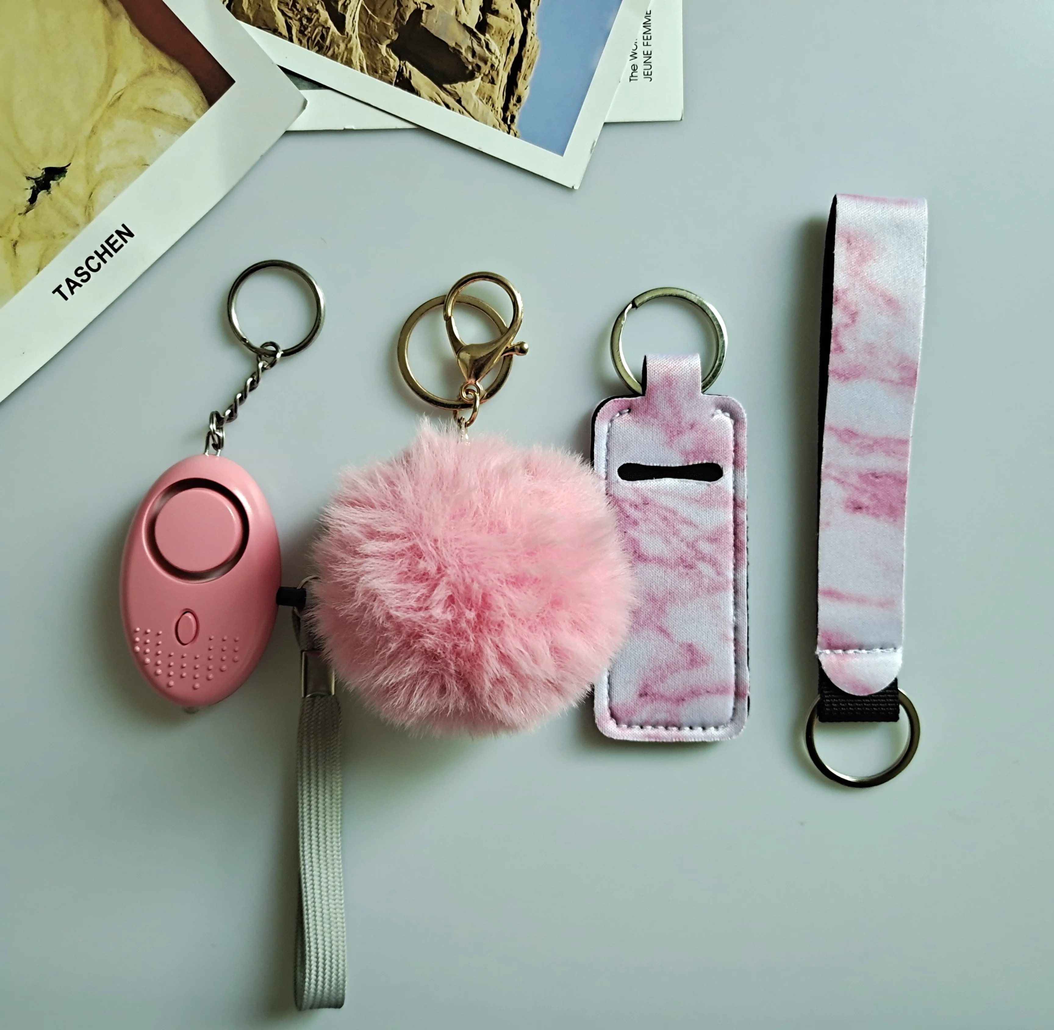 
New Fashion Pom Pom Lip Chapstick Holder Wristlet with LED Alarm Keychain Self Defence Products Set For Women  (1600223091617)