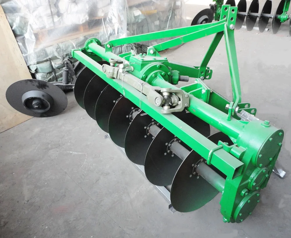 agricultural tractor rotary driven disc plough