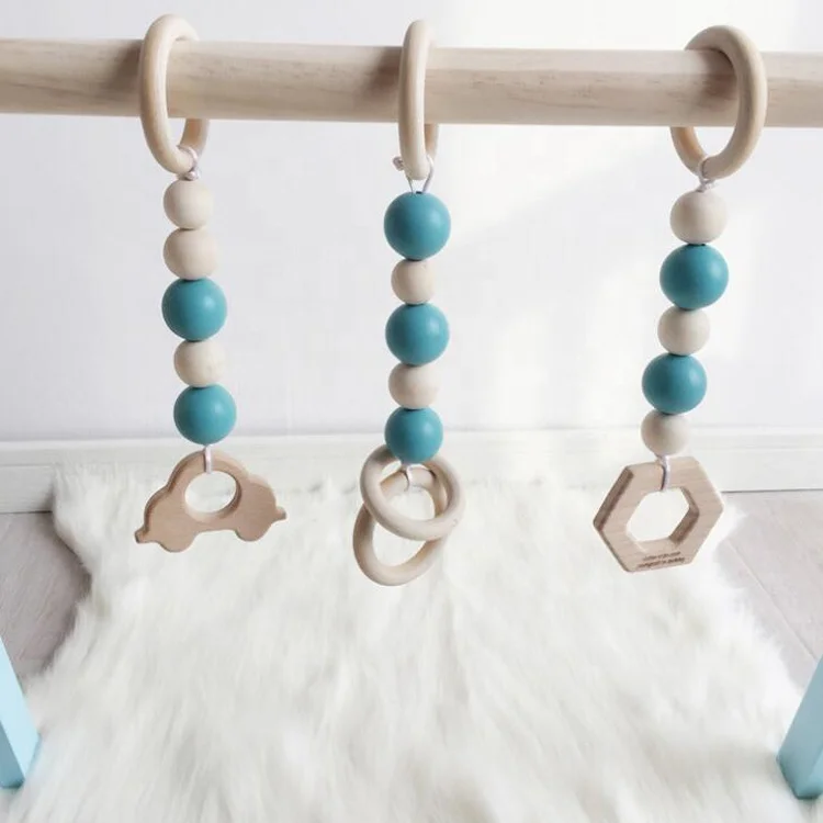 
Hot Selling Plain Portable Safety Material Home Crib Gym Activity Cute No Frame Wooden Baby Hanging Toys 