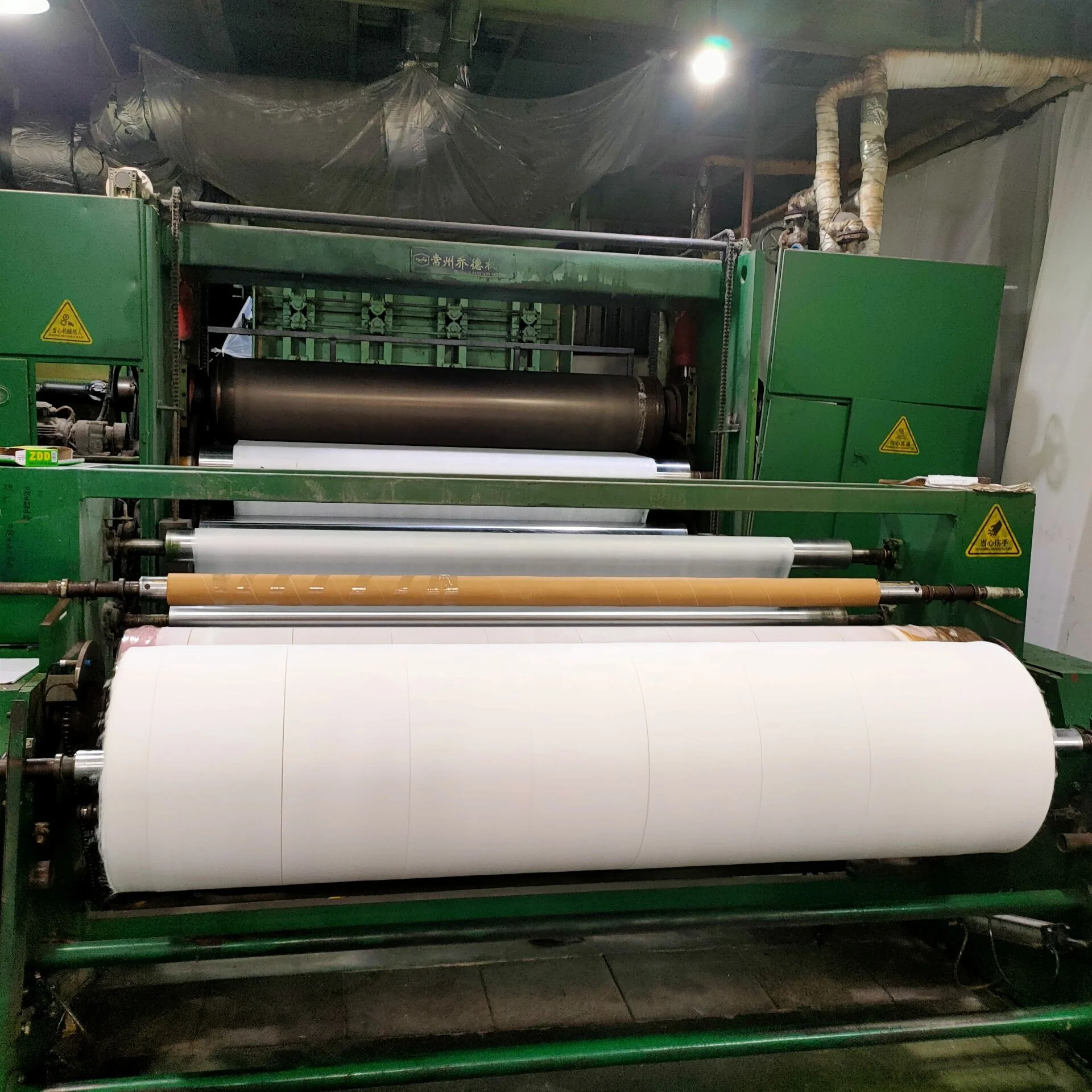 sss	colored hot suzhou non-woven fabric,xinyuan modern non woven fabric raw material filter 35gsm pp spunbond
