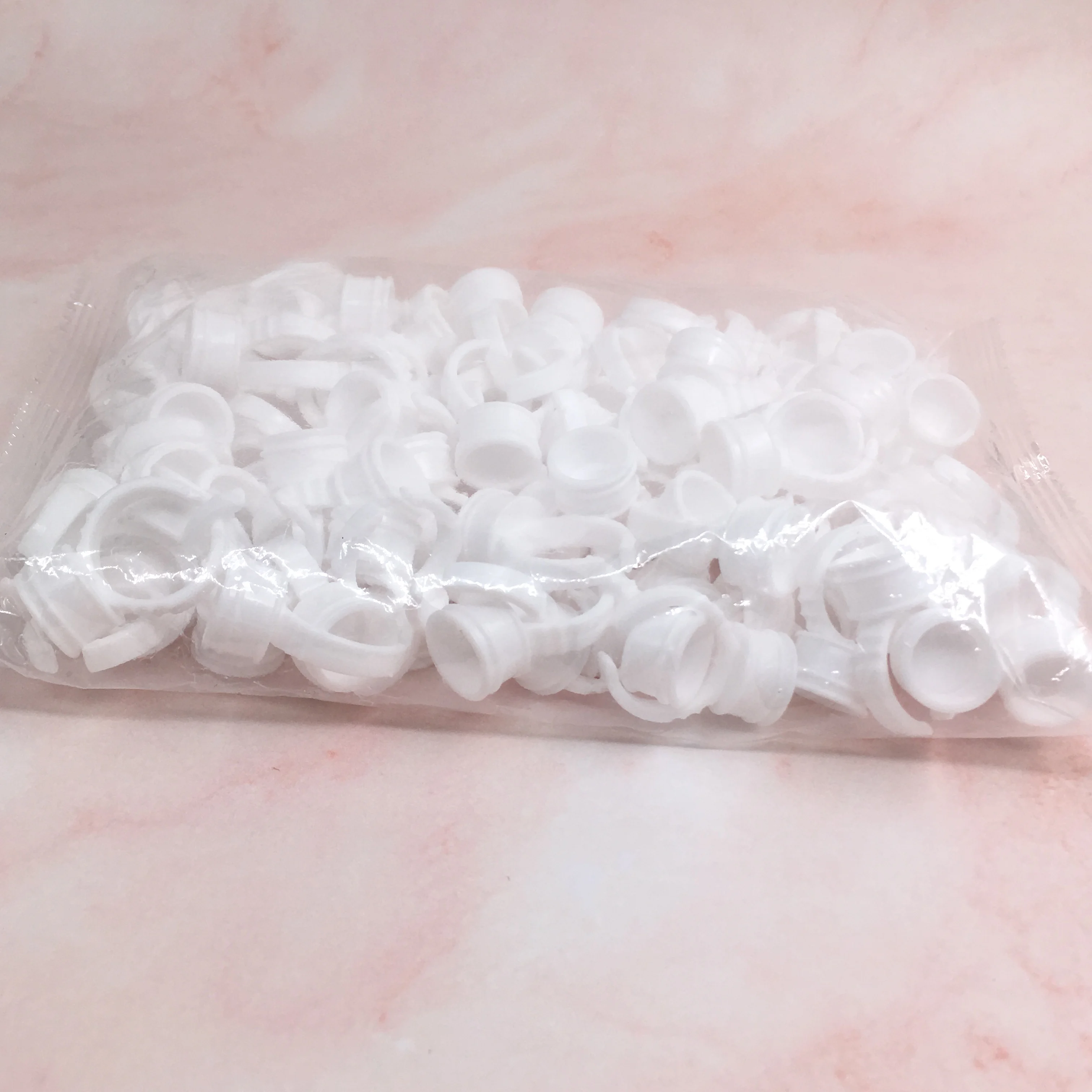 Wholesale Eyelash adhesive holder 100 pcs/pack Plastic Disposable Eyelash Extension Glue Plastic Eyelash Glue Rings