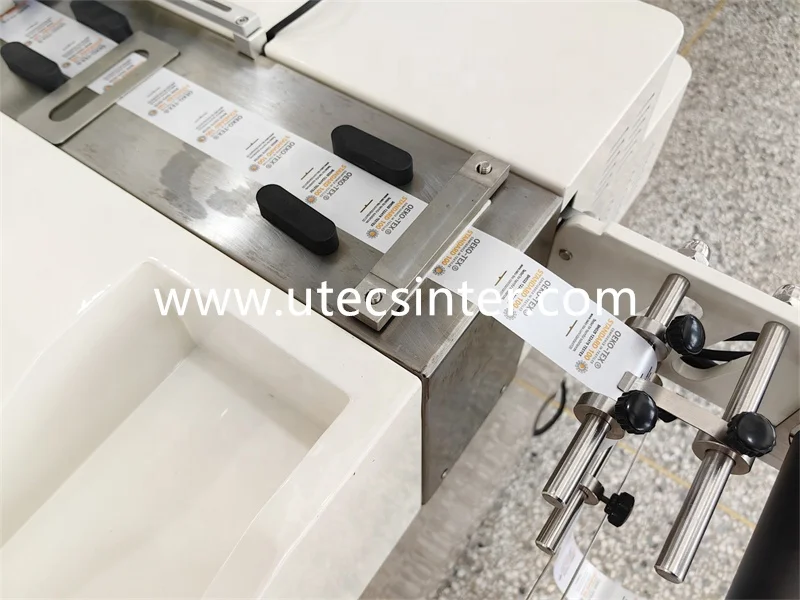 UGS2080 High Speed Ultrasonic Garment Wash Care RIbbon label Cutter with Belt Conveyor Stacker