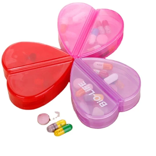 Cute Heart shape pill box with four compartments  and can changed it with oval shape  pill holder