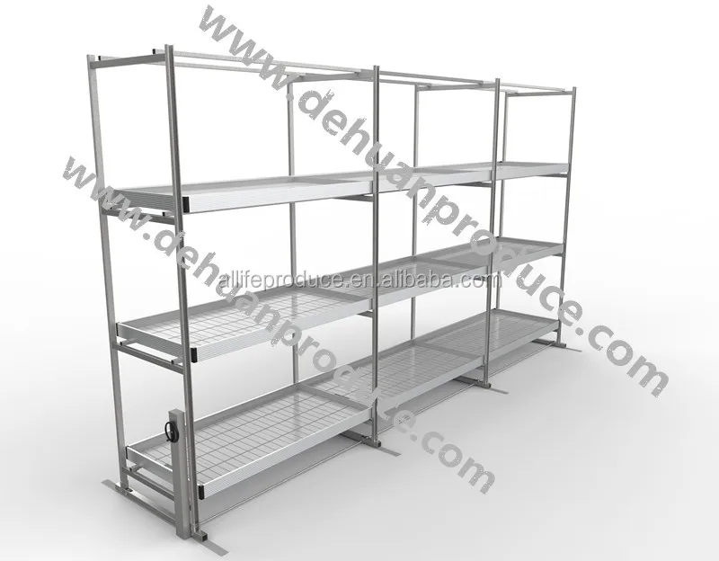 Vertical hydroponic grow tables ebb and flow tray rolling system